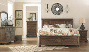 Flynnter - Medium Brown - 6 Pc. - Dresser, Mirror, California King Panel Bed with 2 Storage Drawers, Nightstand