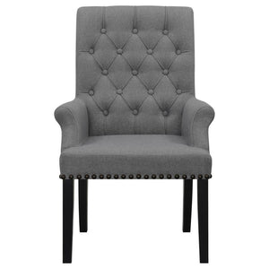  while the addition of padded armrests enhances comfort. Hand-applied nailhead trim o