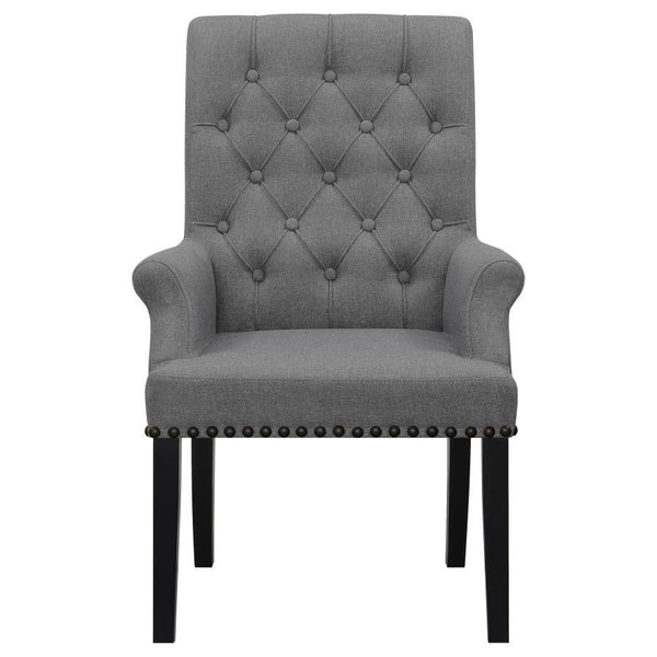  while the addition of padded armrests enhances comfort. Hand-applied nailhead trim o