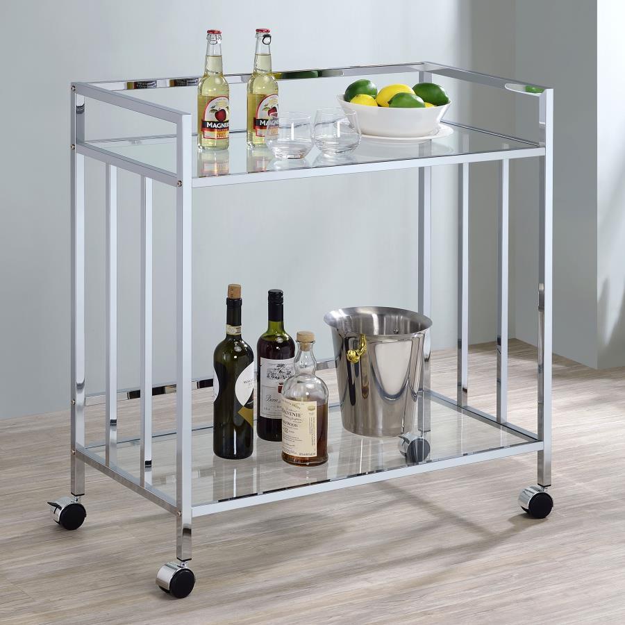 Welcome guests and serve up libations with this sleek contemporary bar cart. A rectangular silhouette outlined in a slim, square metal frame lends an Art Deco-inspired aesthetic to dining spaces and more. The polished, metallic finish elevates it even fur