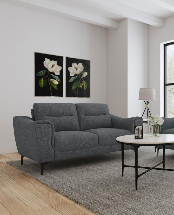  while plush pocket coil seat cushions and modern track arms provide inviting support for your downtime. Designed 