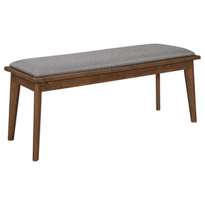 Accommodate overflow seating without the hassle of finding extra chairs. Inspired by a retro design model, this everyday dining bench delivers a fresh new vibe that blends perfectly in modern or more traditional design schemes. Warm walnut finish wood com