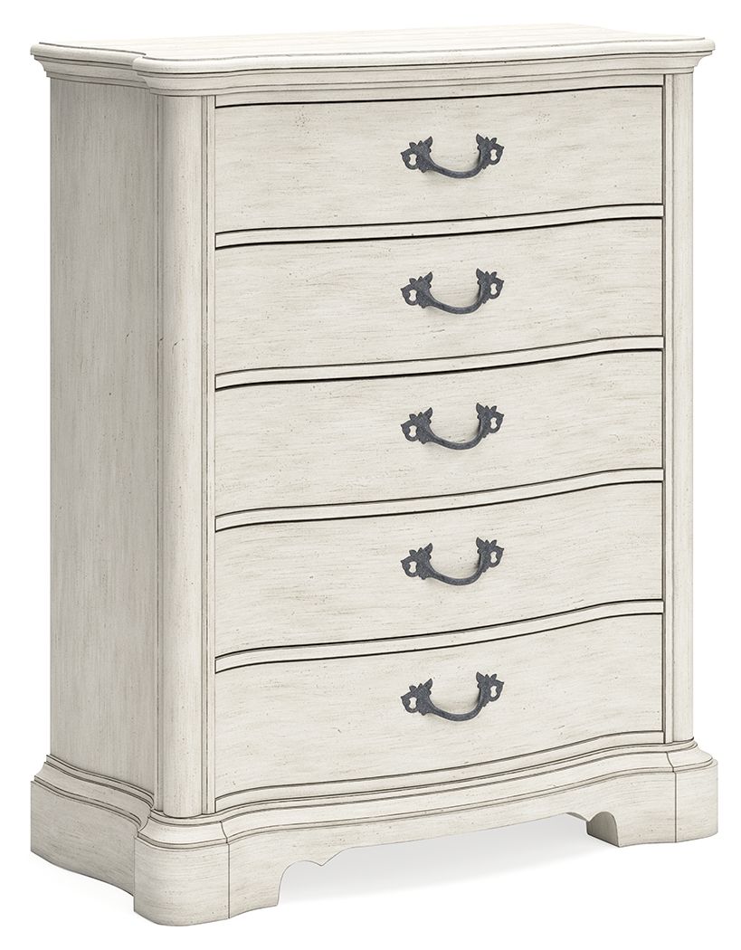 Add a touch of romance to your bedroom with this chest of drawers. Its antiqued white painted finish and serpentine-shaped silhouette details are the picture of easy elegance. Five spacious drawers offer ample storage space, while custom-designed bar pull