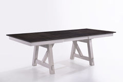 The Maisie Wood Two-Tone Dining Table offers a perfect blend of quality craftsmanship and welcoming rustic charm, ideal for any dining space. This table, crafted from solid rubberwood, manufactured woods, and Mindy wood veneers, is designed for durability