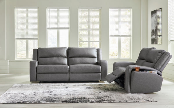 This reclining sofa and loveseat set appeals to your love for feature-filled furniture, all while maintaining a clean-lined and contemporary design. Pop-out storage and cup holders keep essentials close when you need them and tuck away easily when you don