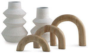 Craft a contemporary haven with the delightfully neutral tones and modern forms of this accessory set. Its sculptures, with their seamlessly streamlined arch designs, can be displayed together or stand solo as subtle statement pieces. The tiered look of t