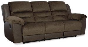 The Dorman sofa features soft-to-the-touch upholstery along with a dramatic style that steals attention. Featuring effortless reclining, it offers easy comfort for relaxation. This sofa is in a league of its own. All that-'s missing is you.<br><br><b>Addi