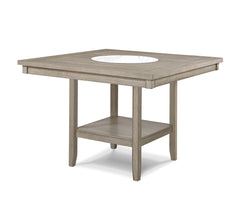 Elevate your dining experience with this elegant counter height dining set, designed to blend seamlessly with any modern or rustic dÃ©cor. The set features a spacious, finely crafted table with a built-in faux marble turntable and open lower shelf in a we