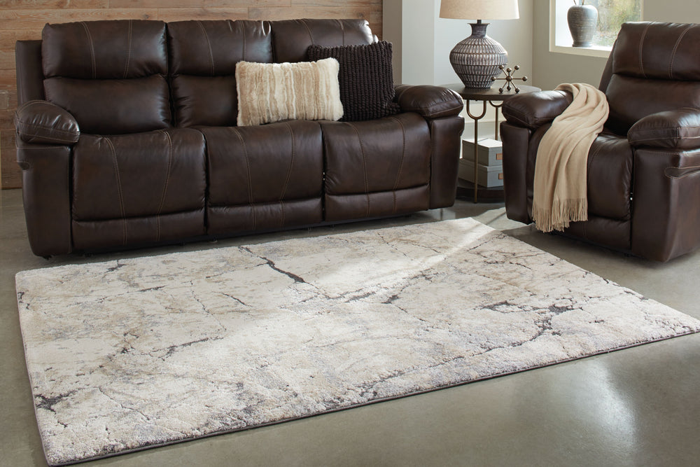 Color trends come and go, but the elegance and chic style of this area rug have a truly timeless quality. Intricate high-low abstract patterns bring neutral hues of cream, beige, gray and black, blending with any interior. Superior machine-woven construct