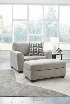 Need a simple style refresh? Liven up your space with this oversized chair and ottoman set. Its sleek design invites you to sink into the generous cushions. Plush, textured upholstery creates a captivating look that works for aesthetics ranging from class