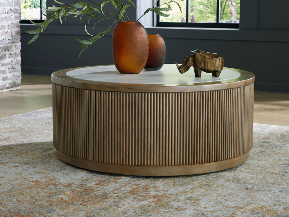 Elegance meets earthy charm in this coffee table. Crafting a contemporary living room? The faux marble top expertly pairs with the reeded base for a trend-right take on day-to-day function. Itâ€™s an ideal spot to rest decorative books and accents. Or pla