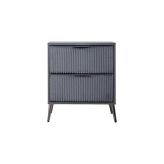 The Kailani 2 Drawer Nightstand in gray is the perfect combination of modern design, durability, and practicality, making it an essential addition to any bedroom. This nightstand is expertly crafted from a blend of solid rubberwood, engineered wood, and e