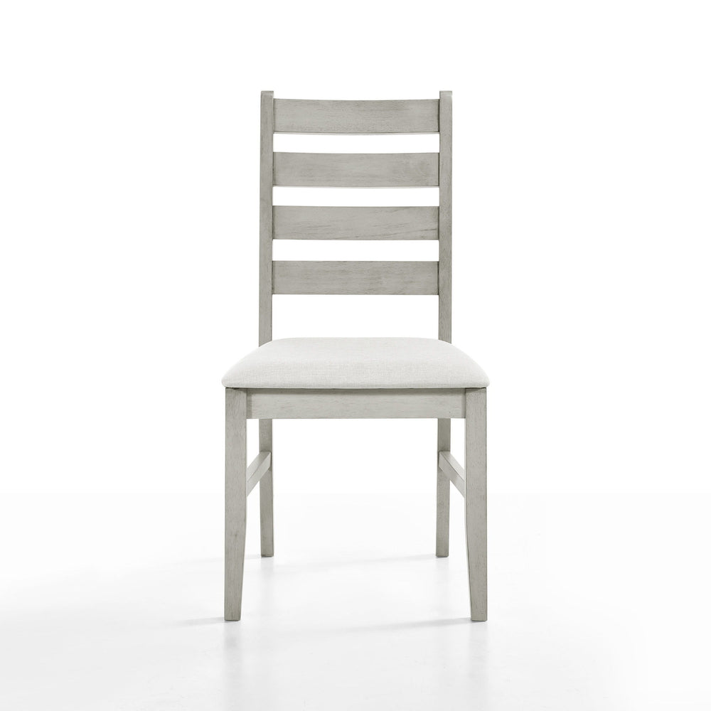 Enhance your dining experience with the Pascal Ladderback Dining Chairs in Driftwood Gray. This set of two chairs is crafted from solid Rubberwood, ensuring long-lasting durability and stability. The chairs feature side stretchers for added strength, maki