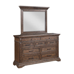 Discover the Mar Vista Dresser and Mirror, where timeless craftsmanship meets sophisticated design. Constructed with solid Rubberwood and Oak veneers, this dresser ensures robust durability. Its rich walnut finish, achieved through meticulous distressing,