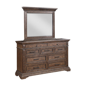 Discover the Mar Vista Dresser and Mirror, where timeless craftsmanship meets sophisticated design. Constructed with solid Rubberwood and Oak veneers, this dresser ensures robust durability. Its rich walnut finish, achieved through meticulous distressing,