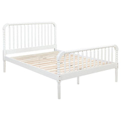Embrace timeless charm with this Jenny Lind-style platform bed, featuring classic bobbin spindles for a vintage-inspired look. Crafted from solid rubberwood and pine, it offers lasting durability and sturdy support. The gracefully curved headboard and foo
