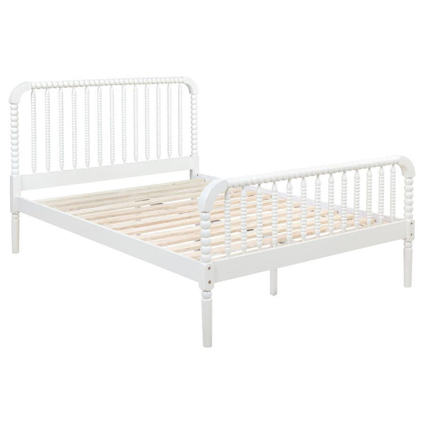 Embrace timeless charm with this Jenny Lind-style platform bed, featuring classic bobbin spindles for a vintage-inspired look. Crafted from solid rubberwood and pine, it offers lasting durability and sturdy support. The gracefully curved headboard and foo