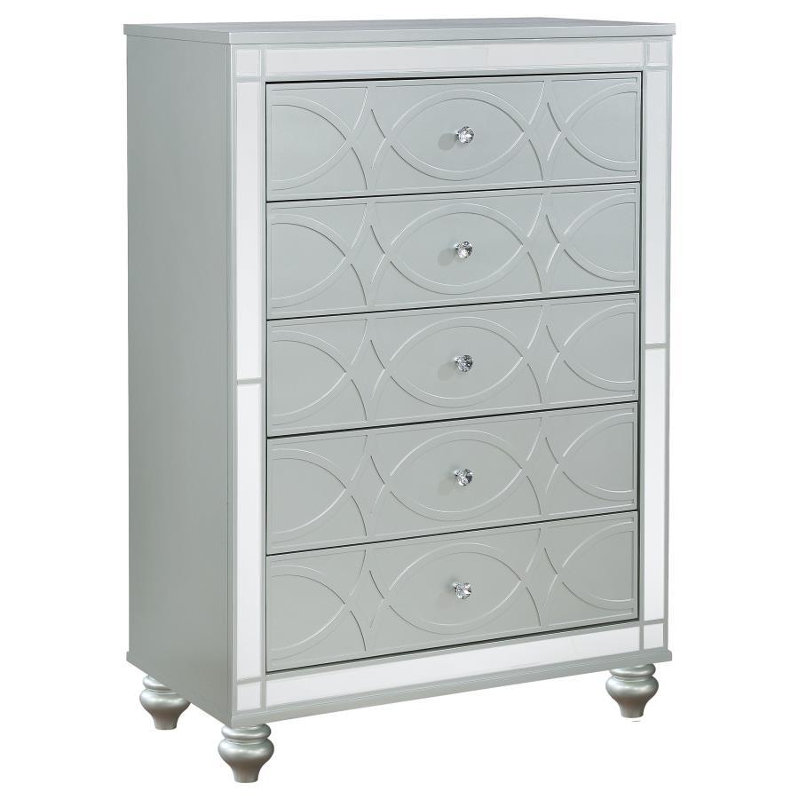 Enhance your home with a modern glam update to a classic design with this transitional five-drawer chest. It boasts a dazzling design that takes lends glitz to any modern bedroom. It comes in a vibrant silver metallic finish with fret work detail on the f