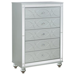 Enhance your home with a modern glam update to a classic design with this transitional five-drawer chest. It boasts a dazzling design that takes lends glitz to any modern bedroom. It comes in a vibrant silver metallic finish with fret work detail on the f