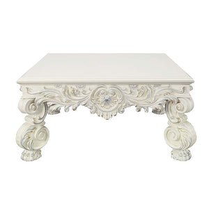  this console table features a round tabletop that is followed by intricate detailing around t