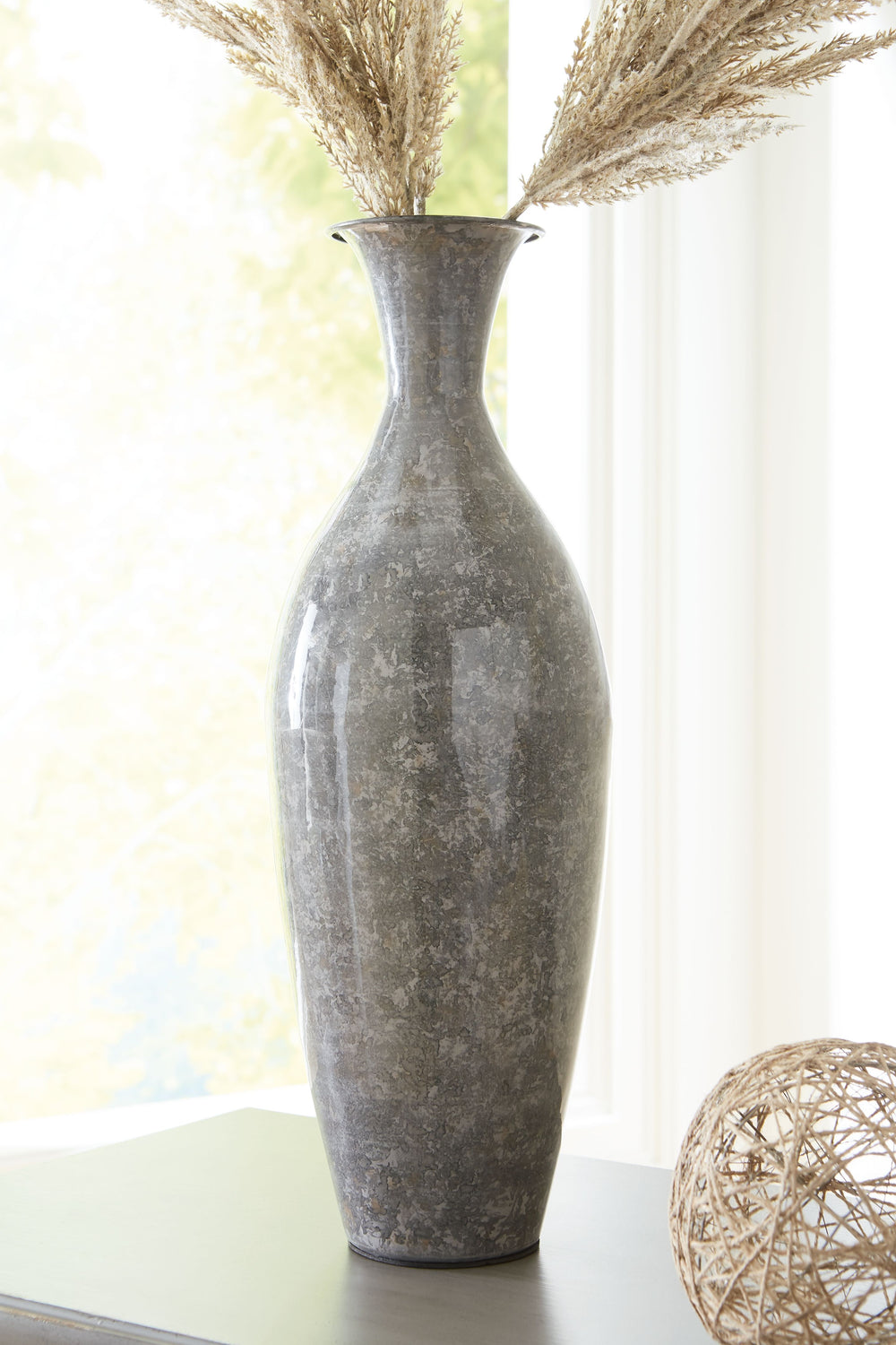 Sophisticated. Subtle. A stunning modern take on traditional. This vase is an homage to unique antiques in a high-gloss gray, bringing vintage character to your decor. Its curated vibe effortlessly complements your love of honoring old-school style.<br/><