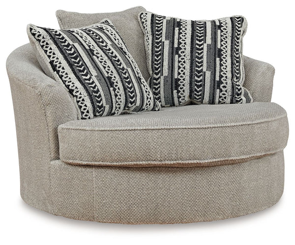 This oversized swivel accent chair caters to your need for contemporary comfort. Large in scale and decked out in feel-good fabric, it gives you space to sprawl out. And the 360-degree swivel motion makes it easy to view the TV or chat with others in your
