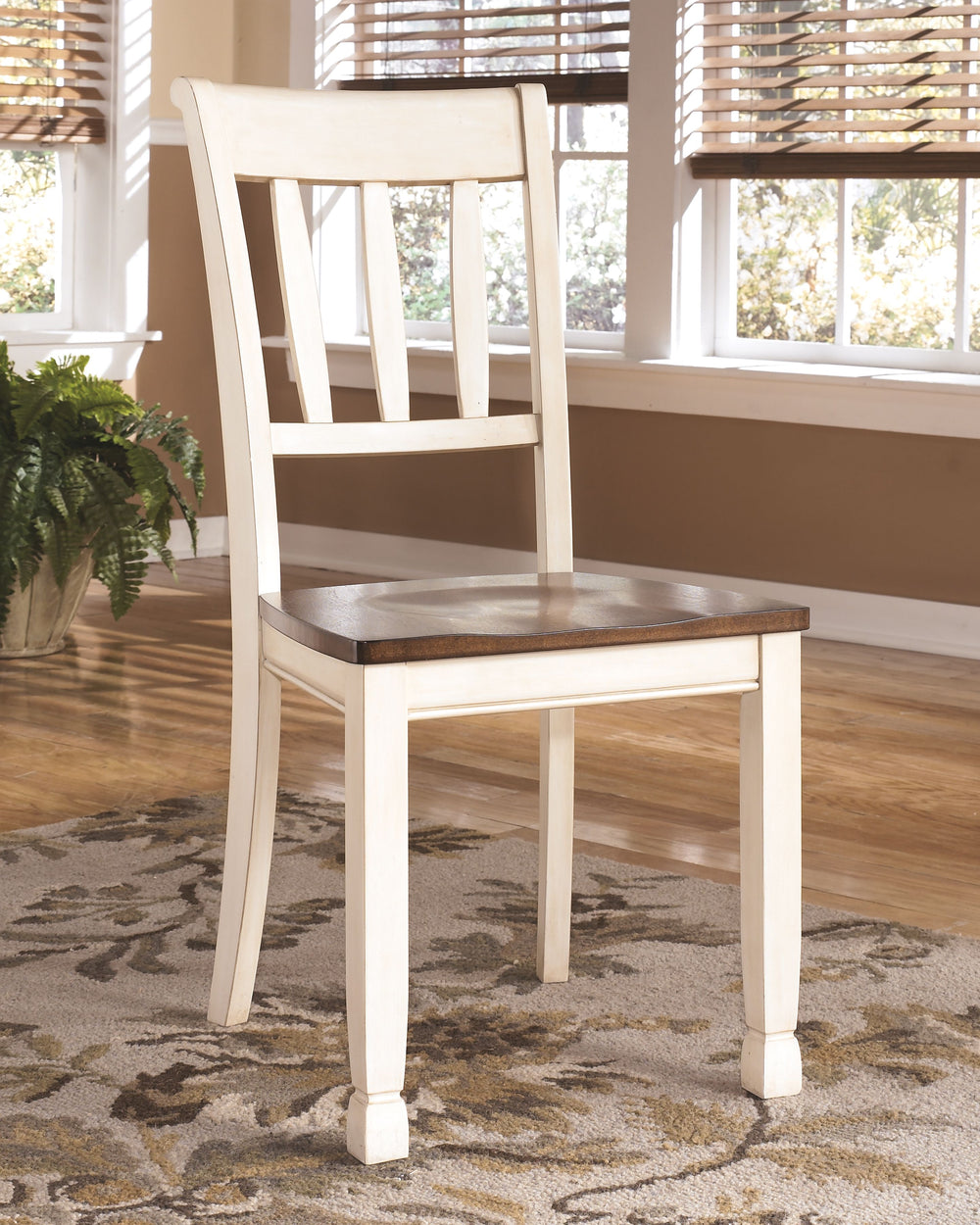 Incorporate cottage-cool warmth in your dining space with this dining room side chair in a classic rake back design. A two-tone finish serves up twice the charm and character.<br><br><b>Additional Dimensions</b><br><ul><li>Seat height: 17.75-"</li><li>Sea