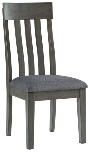 Cool and on-trend. This upholstered dining chair sports a two-tone gray look for a contemporary-yet-casual feel. The cushioned foam seat in a gray textural fabric pairs seamlessly with the antiqued gray finish, while the contoured comb-back design adds a 