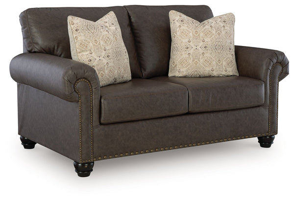 This loveseat marries classic character with a contemporary attitude. Love the timeless look of leather? Its take on deep brown faux leather is versatile enough to pair with styles from traditional to modern, at a price that wonâ€™t break the bank. Detail