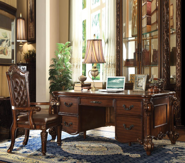 The Vendome executive desk classic style will blend masterfully in your home. Carefully constructed from selected wood and veneers in rich Cherry Finish. Highly decorative details, decorative scrolled legs and moldings are complemented by hand brush accen