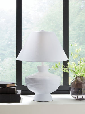  clean and contemporary. This table lamp-'s sculptural base is a forward-thinking approach to fashionable function. Complete with a crisp white finish and horizontal stripe details