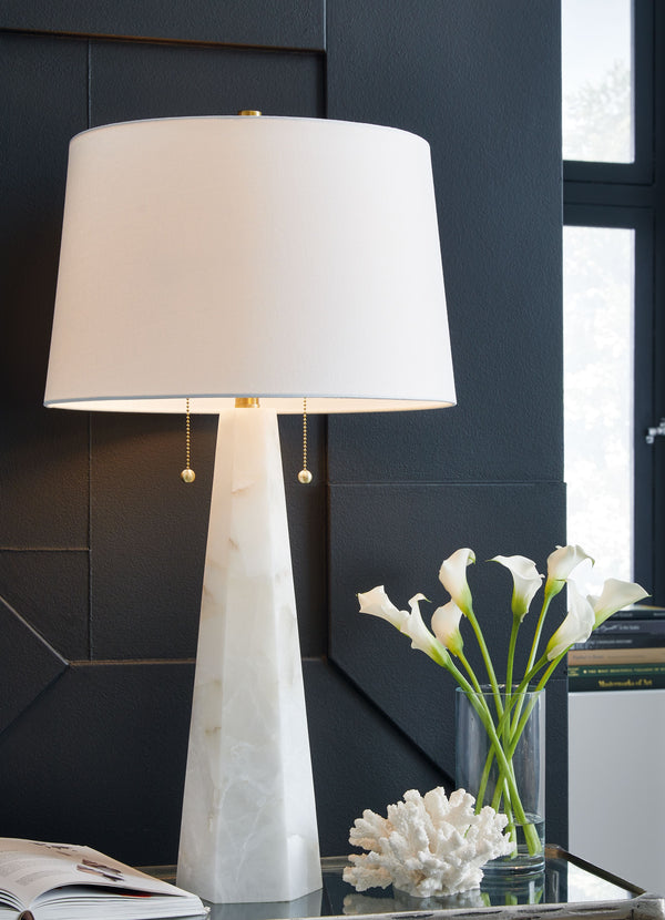  its sleek sculptural silhouette allows it to double as artful decor. Clean and contemporary