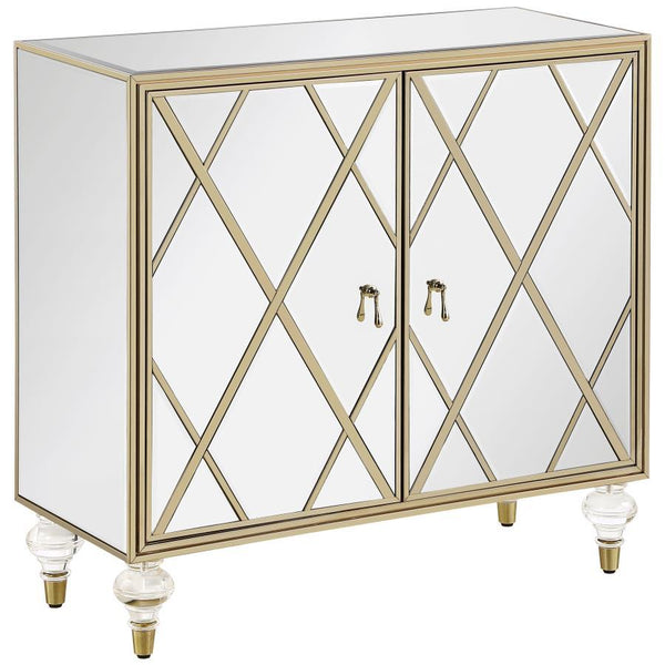 Polished materials and luxe accents combine to create this stunning, glam accent cabinet. Covered almost entirely in mirror surfaces, this accent cabinet boasts a latticed design in the dual cabinet doors, inset with a champagne diamond pattern. The shimm
