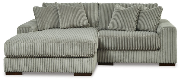 Plush and posh. Showcase your eye for on-trend texture with the statement-making cord upholstery of this sectional with chaise. Its stunningly soft fabric entices in a warm neutral hue, complementing contemporary color palettes. Sink into the cushions and