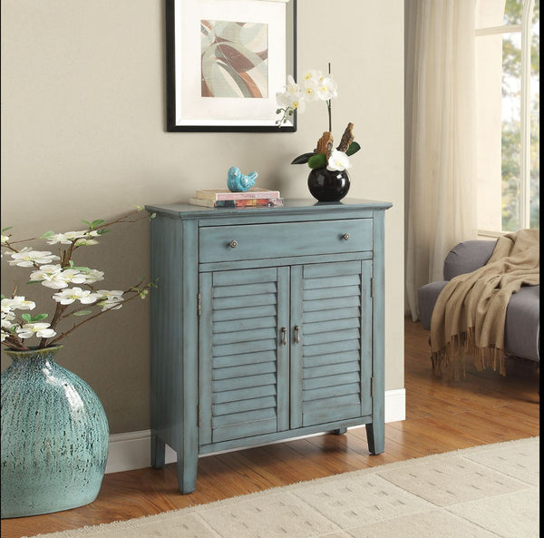 The Winchell console tables in antique blue will be perfect additions to any vintage home Decor. Not only great in design, these occasional pieces also provides spacious storage function with drawers and cabinets. Available in shutter doors or patterned f