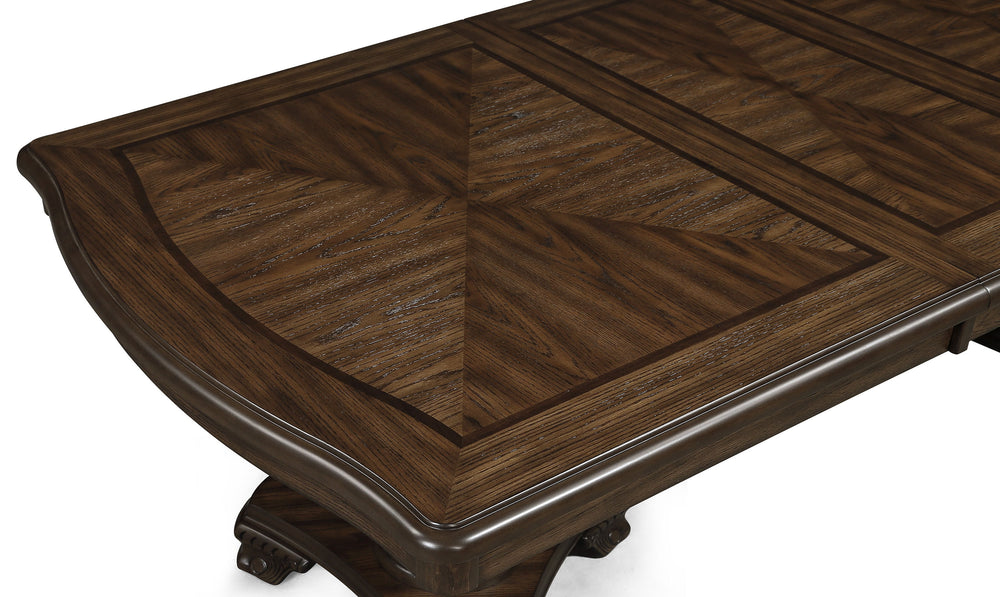 This handsome dining suite features burl and walnut veneers throughout. The table expands from 44â€ to 72-108â€ with 2 x 18â€ leaves, allowing for seating up to 10. Hand carved details accent all the pieces. The chairs have faux leather upholstery and 
