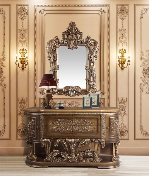 Ornate scrollwork and endless details the Constantine collection takes inspiration from the Baroque era to make up this dining set. The bronze finish creates a regal look to the set. The table sits on highly detailed wooden legs that are not only beautifu