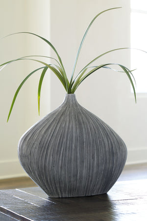  simply stunning in function. This vase captures the eye with its asymmetrical