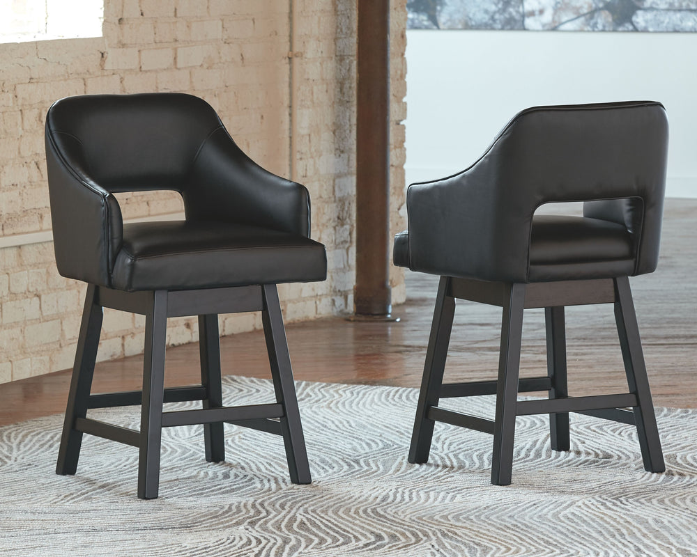 This striking barstool invites you to take contemporary modern style for a spin. Comfortably cushioned seat, self-returning swivel and contoured back make it beautifully in tune with your needs. Luxurious faux leather upholstery is a sensational touch.<br