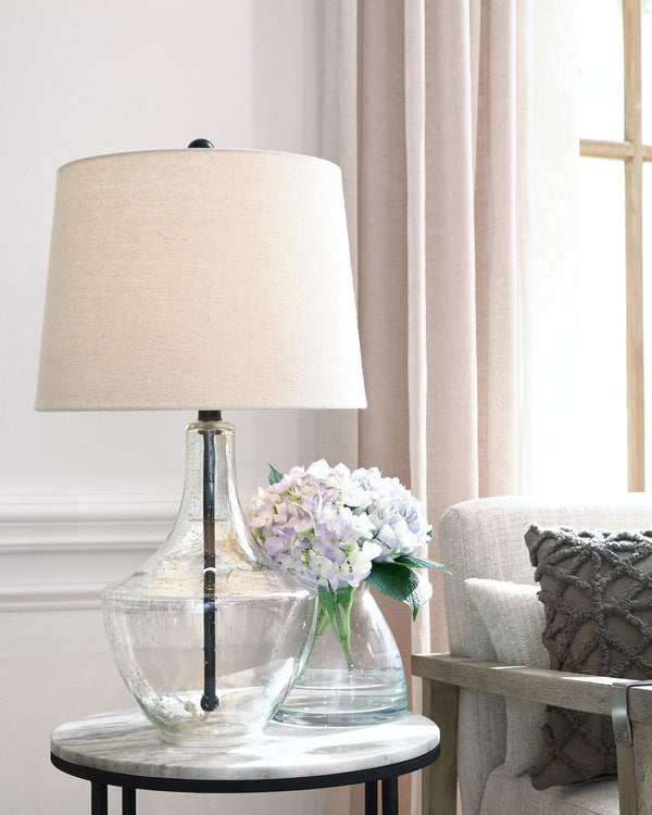  this table lamp sets the scene for high style. Crafted of metal in a fashionable finish