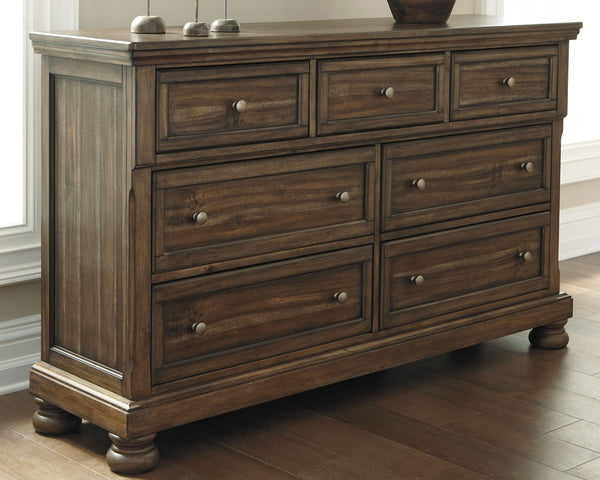  new take on traditional style. This dresser meets todayâ€™s design tastes with beauty and grace. Its tobacco brown finish allows the natural grain of the acacia veneers to show through in an organic way. Aged brass-tone knobs dress the fronts of 