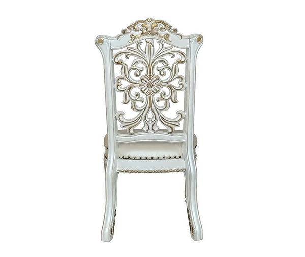  and leaf molding accents to create an old-world charm. The antique p