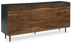 This mid-century modern inspired piece is skillfully crafted with durable solid mango and shesham wood. The natural and deep brown finish in addition to the fluted, grooved door fronts provide character anywhere itâ€™s displayed. Pair it with sumptuous ve