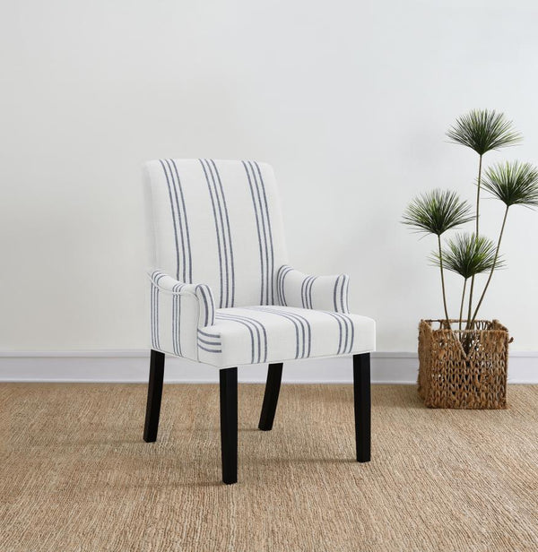  blending comfort with casual elegance. Upholstered in linen-like beige fabric with blue stripes