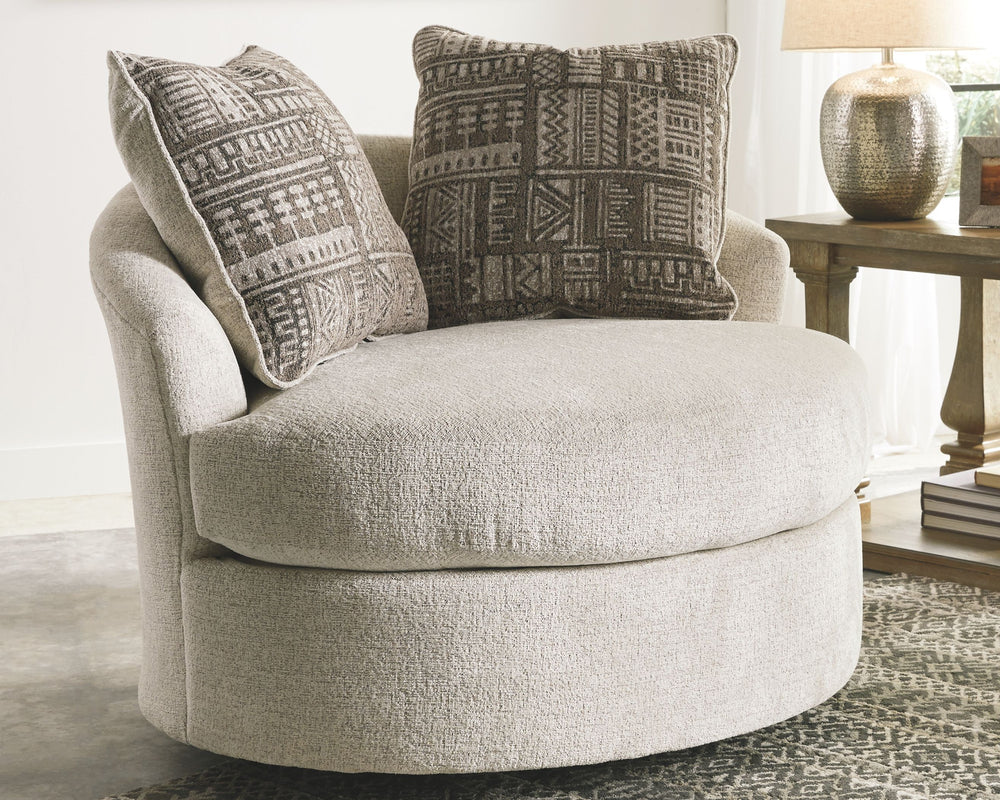 Flaunting a trendsetting silhouette, this swivel accent chair puts the contemporary in your contemporary home. Its 360-degree swivel gives you an around-the-room view to complement your comfort. And the chunky chenille fabric satisfies your need for a pie