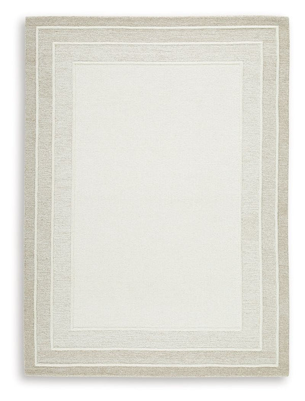 With its simple border design and soft, neutral color palette, this hand-tufted rug brings a touch of casual elegance to your abode. Its plush wool pile feels luxuriously soft underfootâ€”perfect for adding warmth and texture to your entertainment area, b