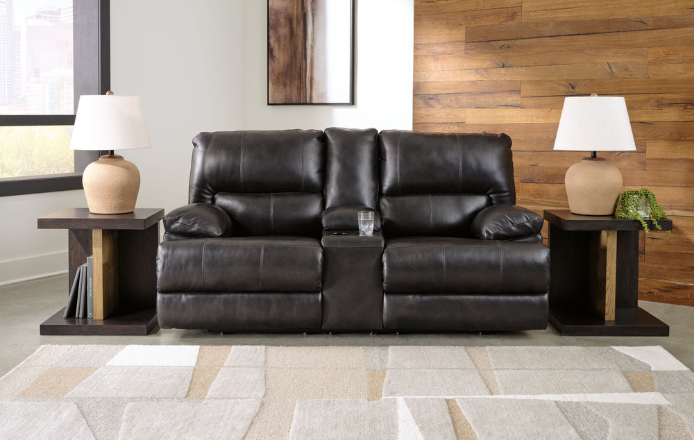 Striking form, meet contemporary function. This power reclining loveseat combines your ideal comfort features, like one-touch reclining and adjustable headrests, into one sophisticated package. With a design defined by the luxe look of black leather, this