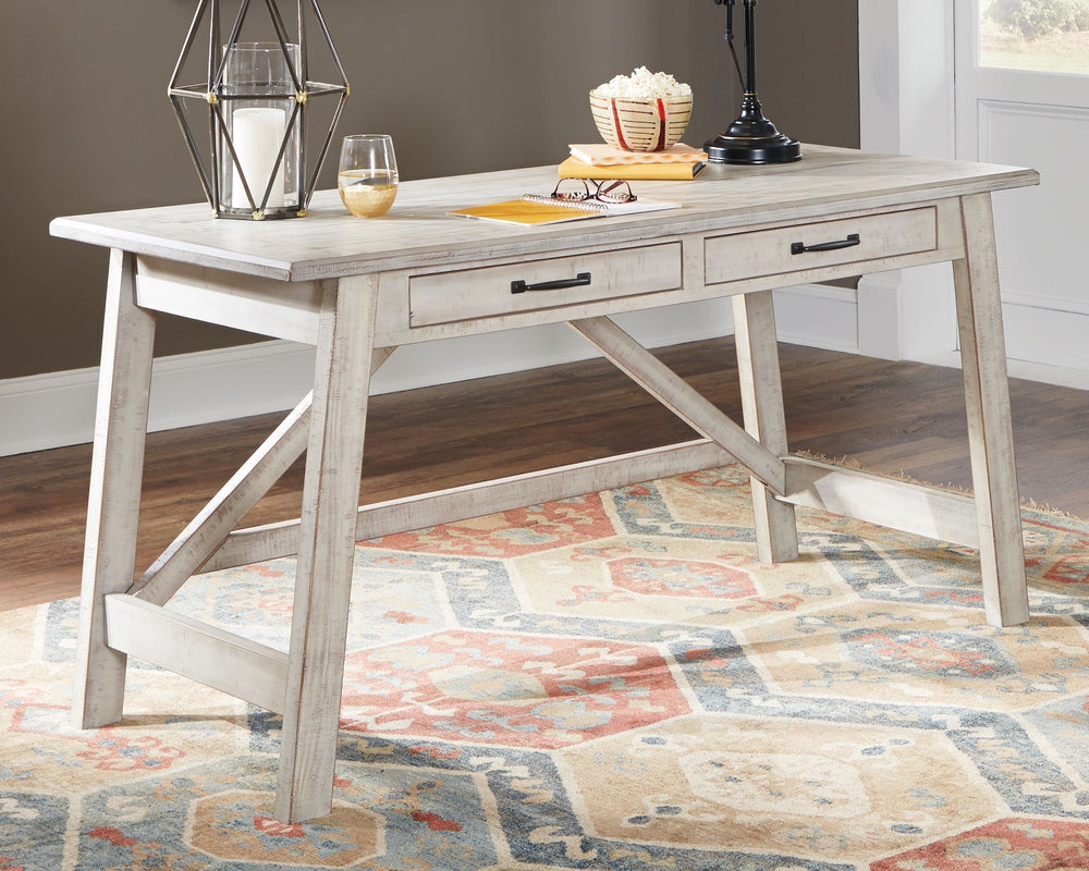 Looking for a fresh approach to modern farmhouse living? This home office desk works on so many levels. Two smooth-gliding drawers with dovetail construction reflect high quality that never goes out of fashion. Whitewash finish is a mastery in subtle soph
