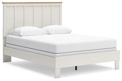 Create a serene countryside retreat with this queen bed. A two-tone design effortlessly adds farmhouse style, while the clean-lined panel headboard enhances its charming appeal. Looking for furniture that offers a peaceful escape from your daily routine? 