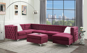 Nothing screams luxury like this Jaszira modular upholstery group. Each piece is enveloped in a luxurious velvet upholstery and showcasing button tufting, and a nail head trim accent for a tailored touch. Foam padding offers comfortable cushioning. Design